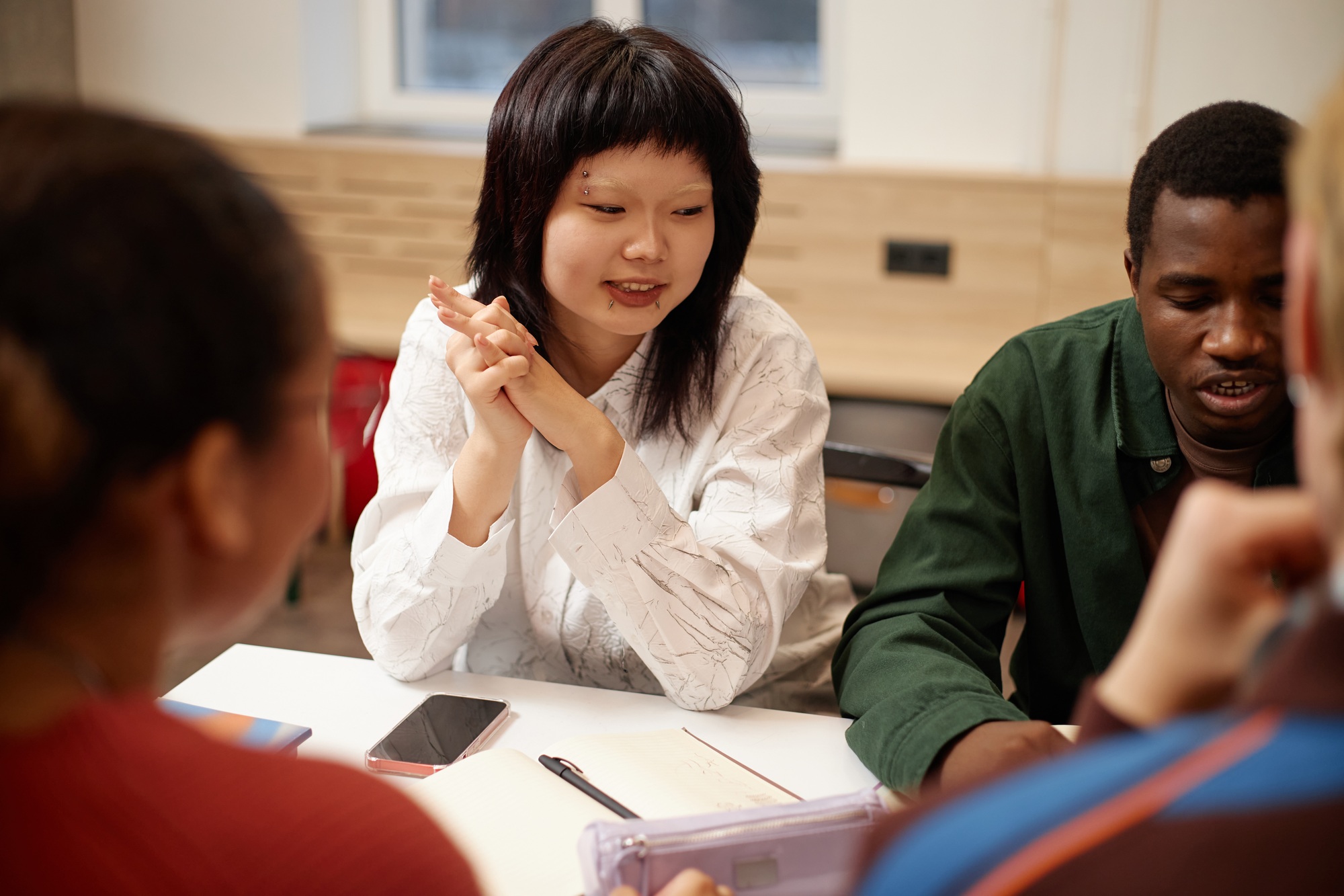 Asian Teenage Girl in Study Group