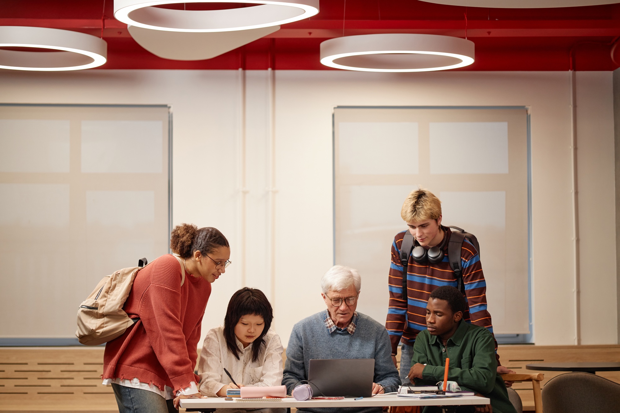 Professor with Students Working Together