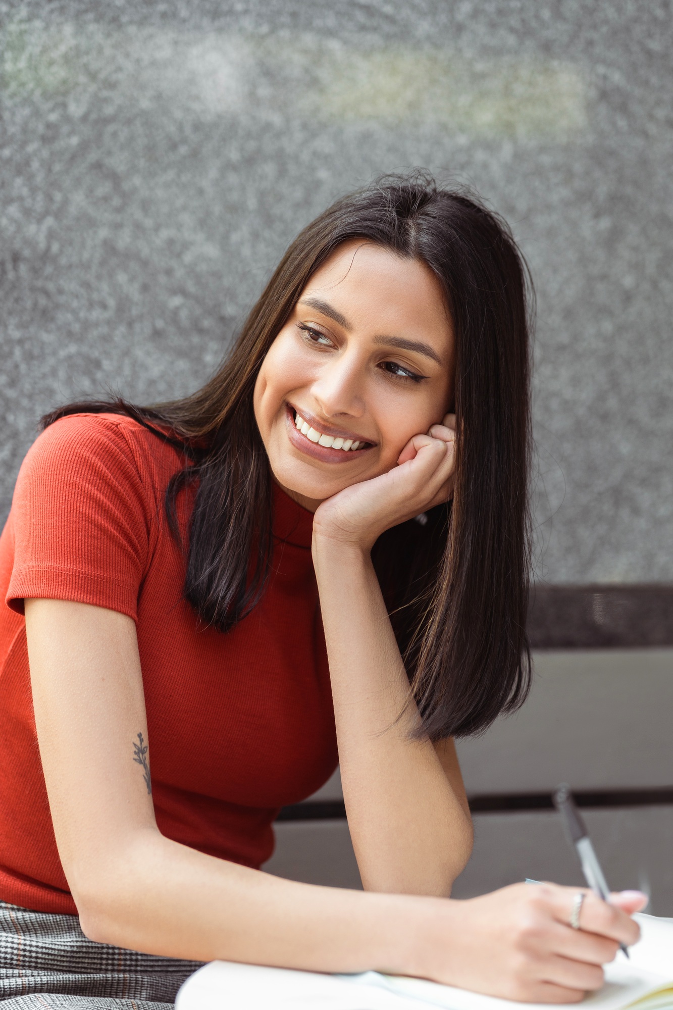 Smart pensive Indian student studying, learning language, exam preparation