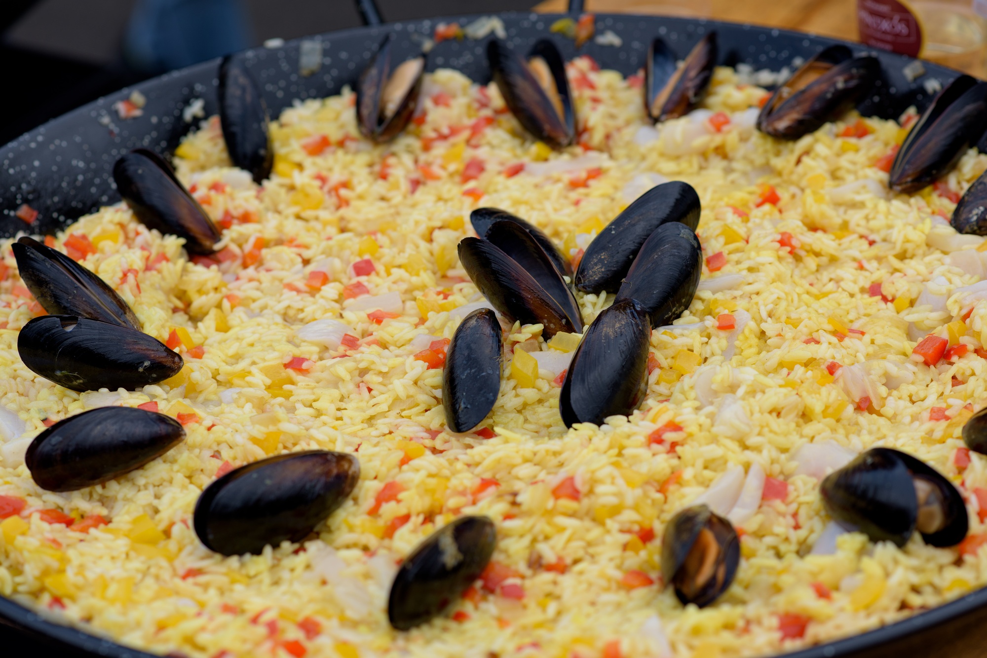 Spanish paella prepared in the street restaurant